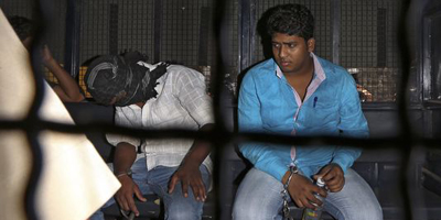 Three sentenced to death for journalist's gang rape in India